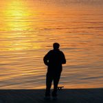 MAN-SUNSET-OVER-WATER-OUTLINE